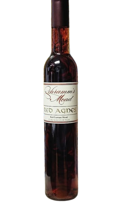 Bottle of Schramm's Mead with a white label on a white background
