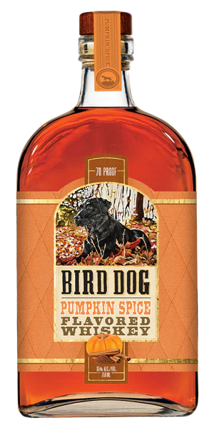 Bottle of Bird Dog Pumpkin Spice Flavored Whiskey with a label featuring a dog in a forest.